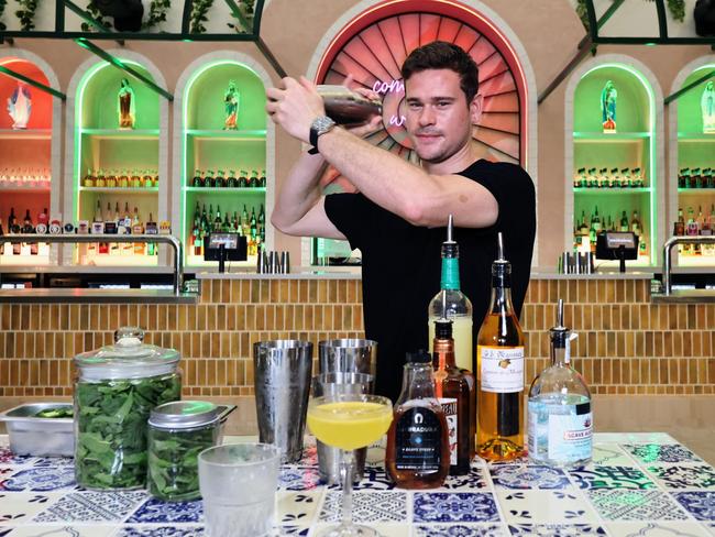 Mexicairns is Cairns' latest entertainment venue, featuring Mexican food and drinks, six classic game zones, lounges, and an agave bar selling Cairns' largest range of tequila. Mexicairns bartender Mark McDowall shakes up some margaritas for thirsty patrons. Picture: Brendan Radke