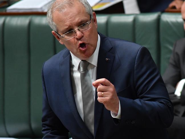CANBERRA, AUSTRALIA - JUNE 10: Prime Minister Scott Morrison speaks at the despatch box during Question Time in the House of Representatives at Parliament House on June 10, 2020 in Canberra, Australia. The federal government is expected to make adjustments to the $70 billion Jobkeeper program which was introduced to help businesses retain staff during COVID-19 shutdowns. (Photo by Sam Mooy/Getty Images)