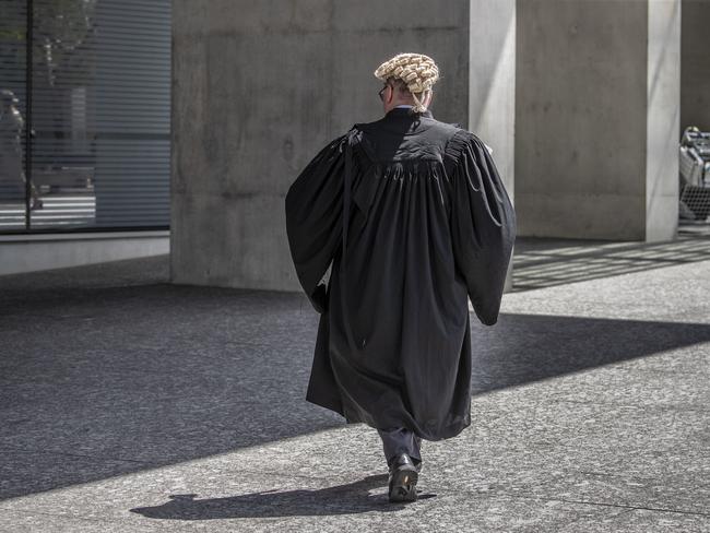 A barrister wears a wig at the Supreme Court in Brisbane, Tuesday, October 29, 2019. (AAP Image/Glenn Hunt) NO ARCHIVING