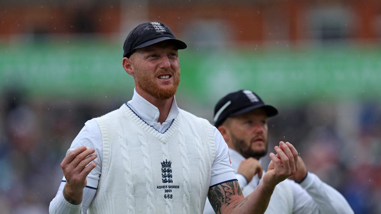 England's captain Ben Stokes leaves the field as play is stopped by rain on day four.