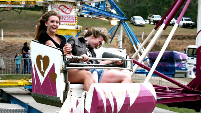 WILD RIDE ON THE WHIZZER: Kayla Naughton and Sandra McCormack had a fun time on the Whizzer at the Mount Perry Show. Photo Rose Reed / Central &amp; North Burnett Times