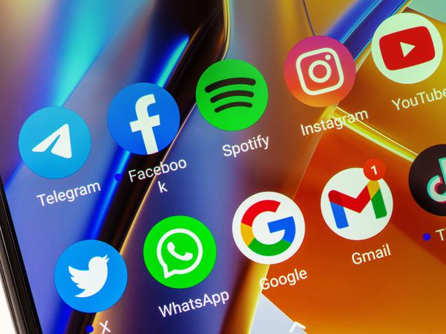 Adygea, Russia - August 11, 2023: telegram, facebook, spotify, instagram, youtube, twitter, whatsapp, google, gmail, tik tok mobile app icons on xiaomi poco smartphone screen closeup