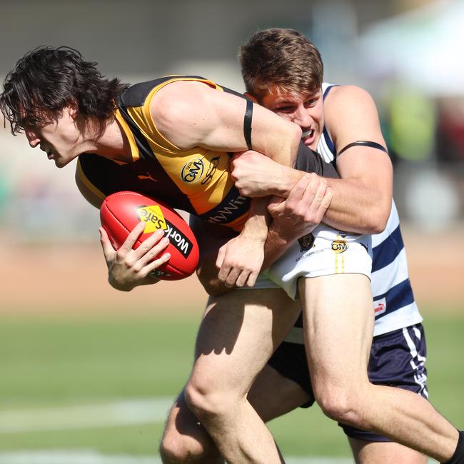 Albury’s Rhys King is tackled by Yarrawonga’s Lach Howe.