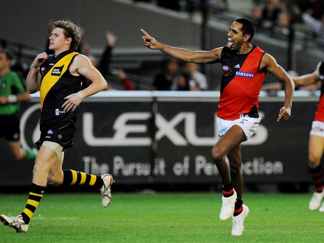 Dreamtime at the 'G. Essendon v Richmond. MCG. Andrew Lovett celebrates kicking a goal to put the Bombers in front in the 3rd quarter as Matthew White throws his head back in disgust