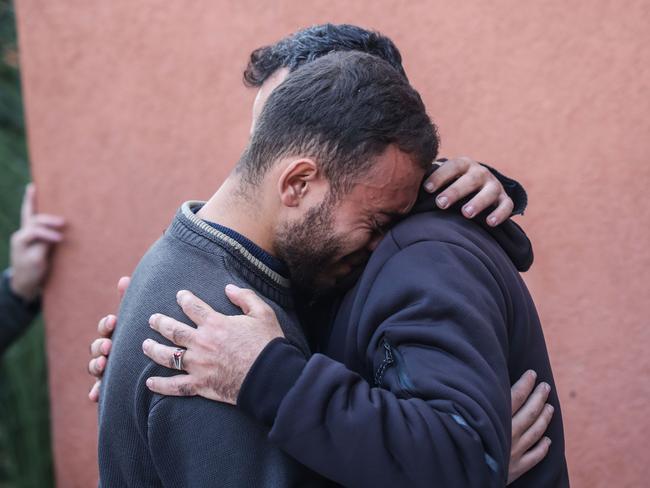 People mourn as they collect the bodies of Palestinians killed in an air strike in Khan Yunis, Gaza. Picture: Getty Images