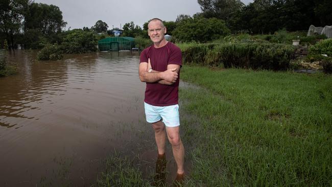 Picture shows Stephen Cooper, and volunteer at Camden Community Garden, Camden, where he spent much of last night saving bee hives and chickens from the floodwater.