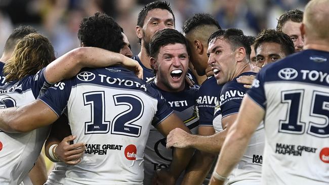 TOWNSVILLE, AUSTRALIA - MARCH 16: Chad Townsend of the Cowboys celebrates after kicking the winning field goal in extra time during the round two NRL match between North Queensland Cowboys and Newcastle Knights at Qld Country Bank Stadium, on March 16, 2024, in Townsville, Australia. (Photo by Ian Hitchcock/Getty Images)