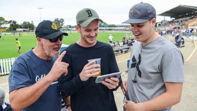 Glenelg fans Ian Nadebaum, Nicholas Sbroiavacca and Taylor Nadebaum won’t be watching Winx race this week and can focus on the game against Sturt. Picture: Brenton Edwards/AAP