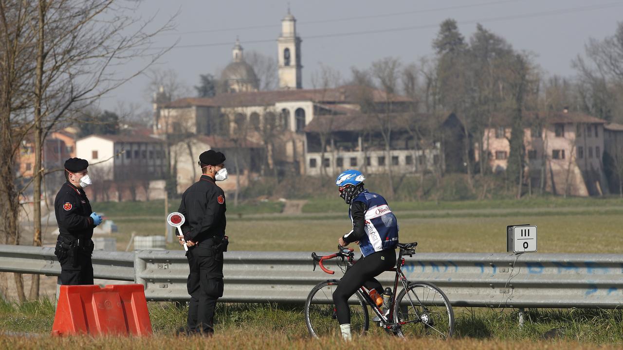 Italian paramilitary police monitor Codogno, in northern Italy. Picture: AP/Antonio Calanni)