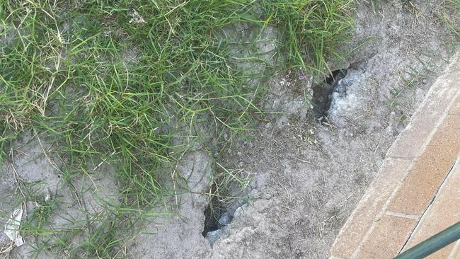 Holes are also forming in the backyard of the couple’s home.