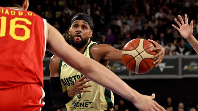 Australia's Patty Mills heads to the basket during the men's international friendly basketball match between Australia and China at the John Cain Arena in Melbourne on July 4, 2024. (Photo by William WEST / AFP)