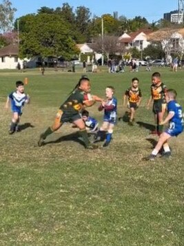 The youngster was filmed scoring an easy try during the match. Picture: TikTok