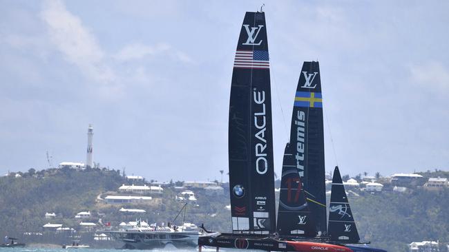 Oracle Team USA, left, and Artemis Racing of Sweden, right, compete in the 35th America's Cup.