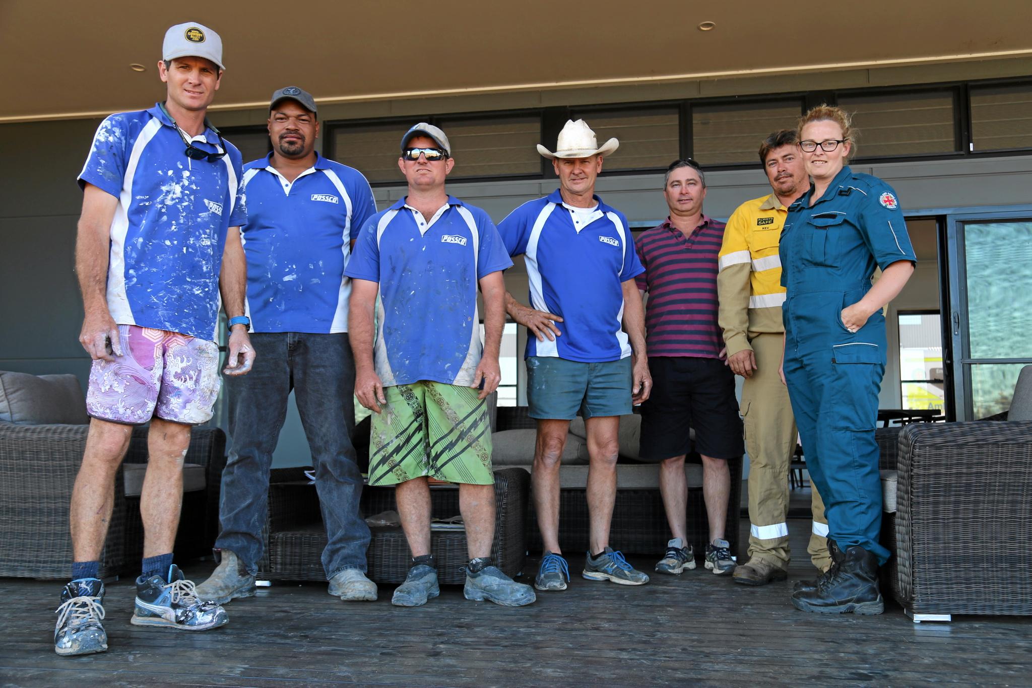 The POSSCO team with Shannon and Kevin Eastcott at their Mundubbera home. Picture: Tobi Loftus