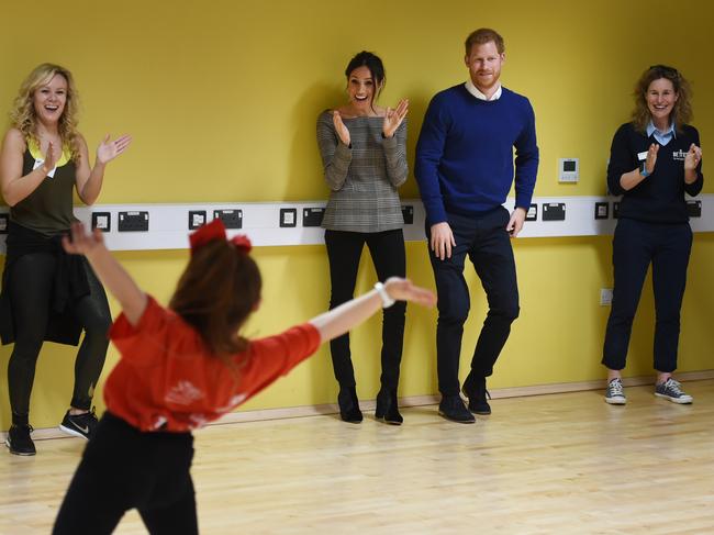 Britain’s Prince Harry and his fiancée Meghan Markle attend a street dance class during their visit to Star Hub community and leisure centre in the Tremorfa area of Cardiff, south Wales on January 18, 2018. Picture: Getty