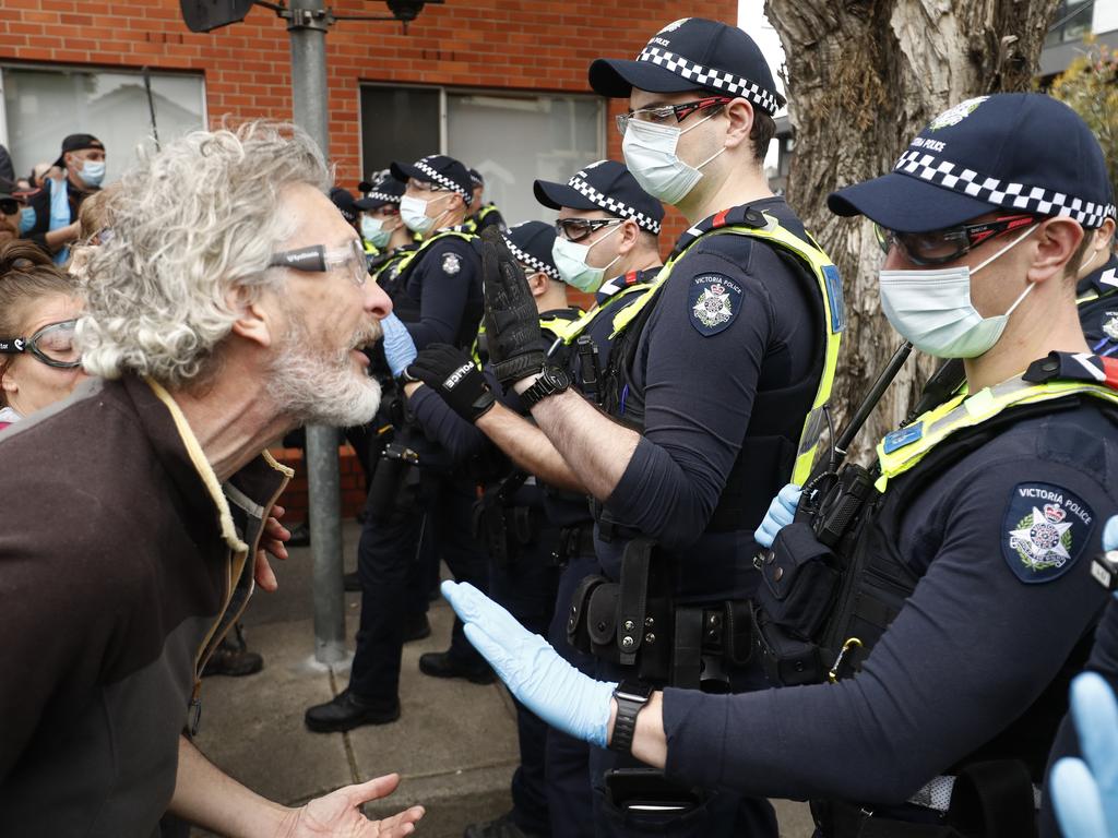 Melbourne, Australia. 5th Aug, 2021. Police give chase to protesters up Collins  Street during a snap protest called on the eve of the 6th lockdown to be  imposed on Melbourne. Hardcore anti-lockdown