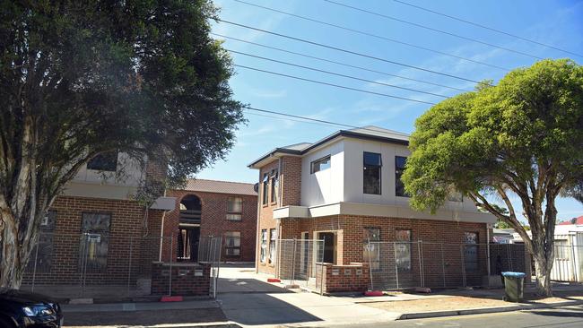 Two houses have been built in front of an existing block of flats on Hill Street, Campbelltown. Picture: Tom Huntley