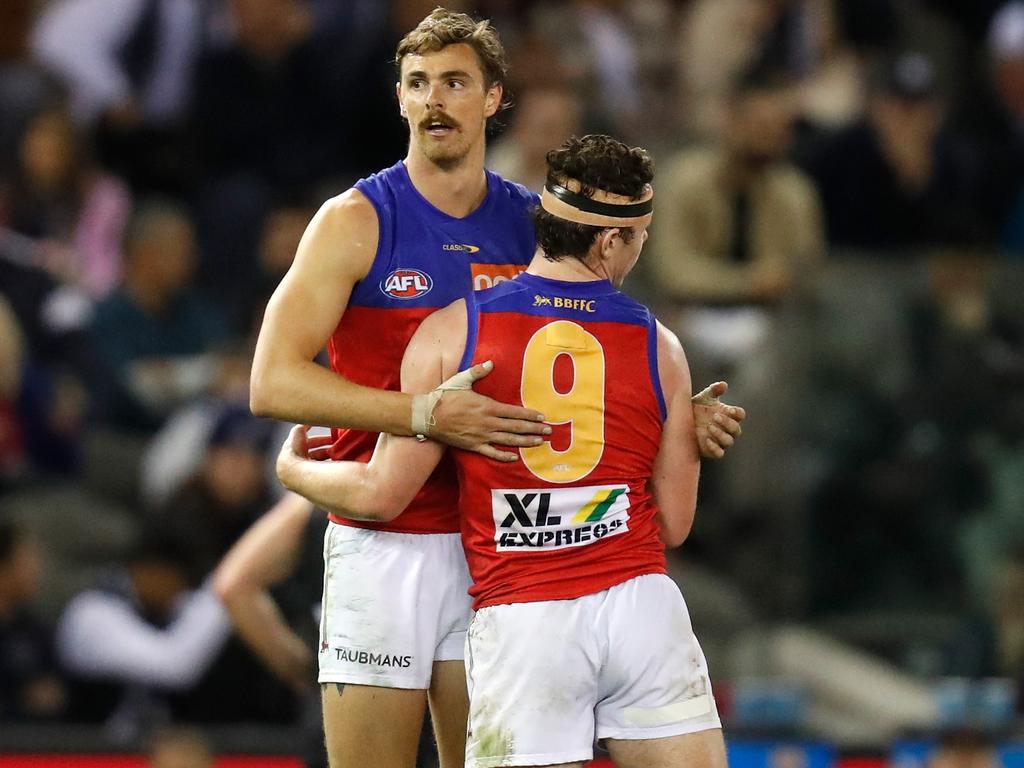 MELBOURNE, AUSTRALIA - APRIL 24: Joe Daniher (L) and Lachie Neale of the Lions celebrate during the 2021 AFL Round 06 match between the Carlton Blues and the Brisbane Lions at Marvel Stadium on April 24, 2021 in Melbourne, Australia. (Photo by Michael Willson/AFL Photos via Getty Images)