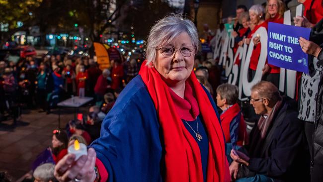 Jane Qualmann in front of the Voluntary Assisted Dying vigil crowd. She is suffering a terminal condition and was a former nun, at Parliament House in Adelaide. Picture: Tom Huntley