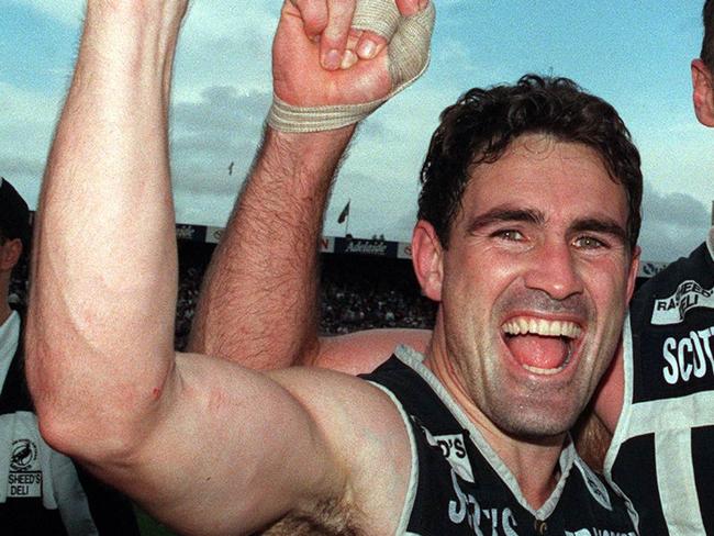 1995 - SANFL grand final, premiers Port Adelaide. Captain Tim Ginever and Roger Delaney./football south australia