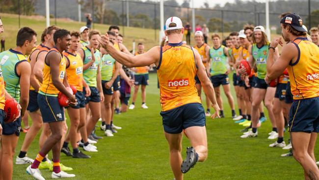 Sam Skinner kicking in a drill at today’s session at the Brisbane Lions pre-season camp at Kingston's Twin Ovals. Picture: Brisbane Lions.