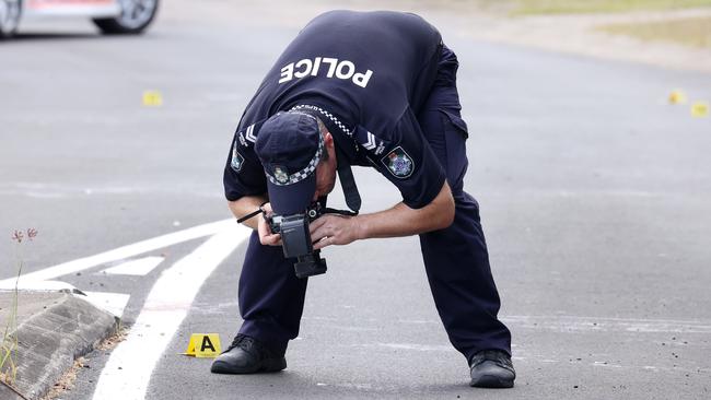 Police investigate a stabbing at Packett Crescent, Loganlea. Picture: Liam Kidston