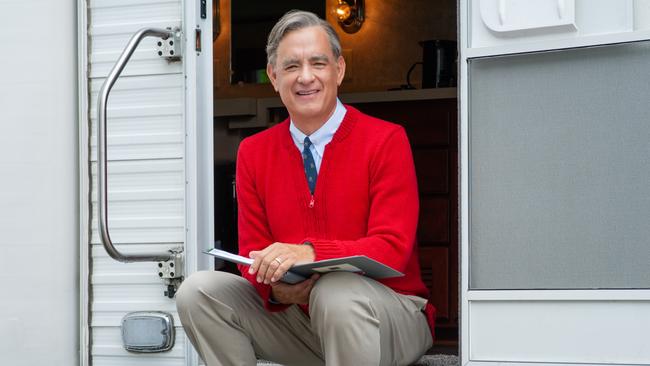 Tom Hanks portrays Mister Rogers in the movie A Beautiful Day in the Neighborhood.