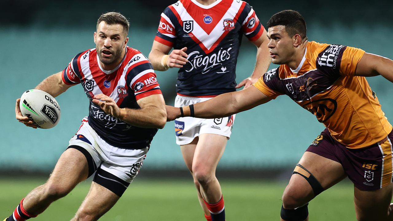James Tedesco of the Roosters makes a break.