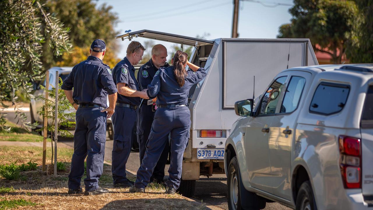 Police outside the Findon home. Picture: Ben Clark
