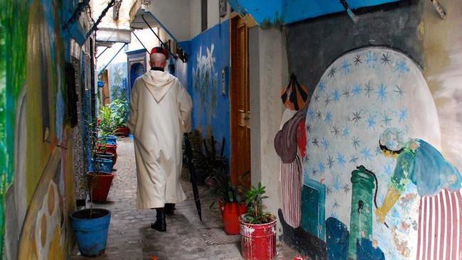 Walking through a laneway in the Tangier medina, Morocco.