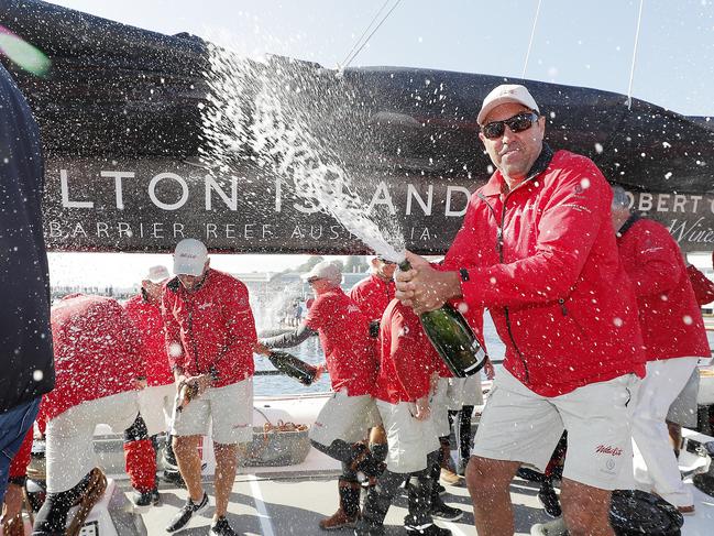 Skipper Mark Richards celebrates Wild Oats XI’s 2018 line honours victory. Picture: RICHARD JUPE