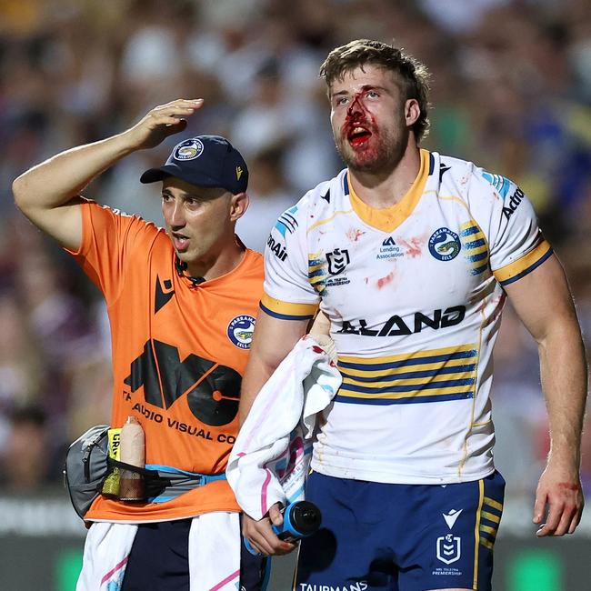 Jack Murchie of the Eels is assisted off the field for a head injury assessment (HIA). Picture: Getty Images