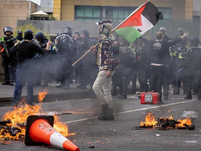 Look at the flags being flown by the protesters. Picture: Getty Images