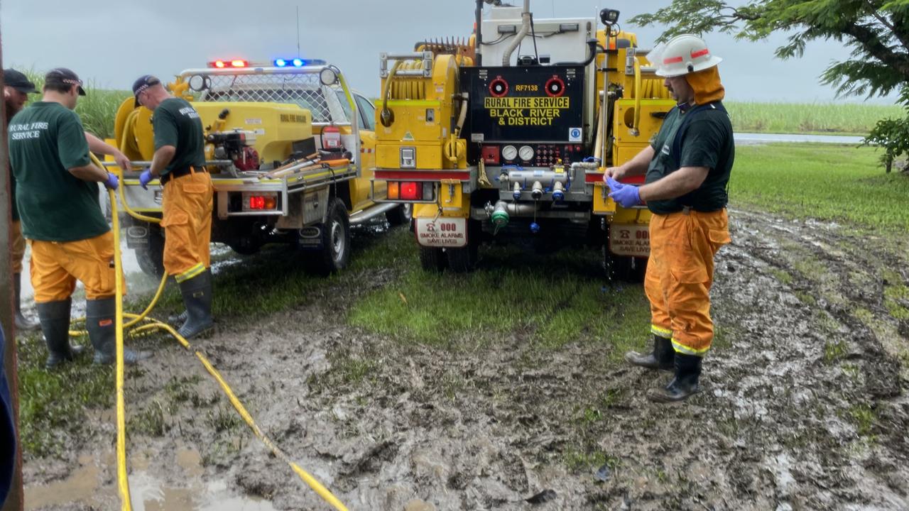 Hanna Johansson works alongside emergency crews in Ingham, helping clear debris and support local flood recovery efforts. Picture: Supplied