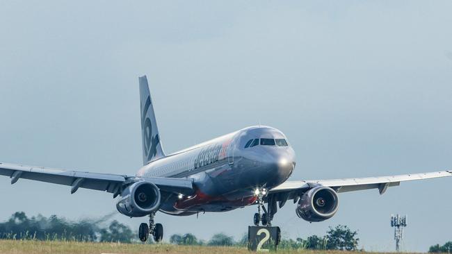 A man was arrested at Darwin airport after an incident on a Jetstar flight. Picture: Glenn Campbell