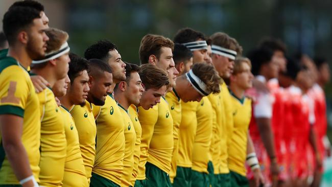 Australia under-20 sing the national anthem before playing Tonga.