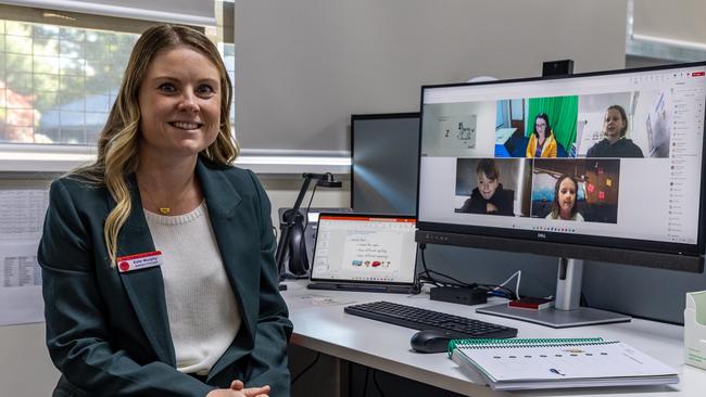 Kate Murphy, assistant principal at the Hay School of the Air with some of her students on screen. Picture: Andrew McLean