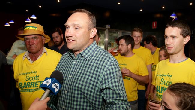 Nationals candidate for Orange Scott Barrett speaks to the media with his father Ian Barrett (left) by his side after massive swings against the party. Picture: Jonathan Ng