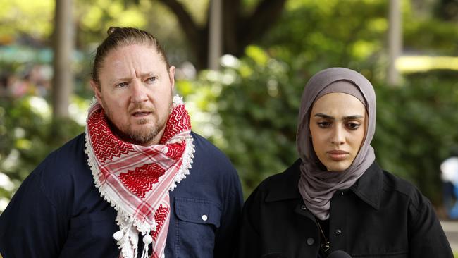 Palestine Action Group spokespeople Josh Lees and Amal Naser in Hyde Park in Sydney. Picture: Jonathan Ng