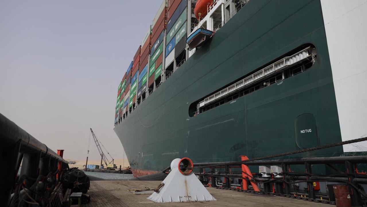 The Suez Canal Authority (SCA) said it was ‘temporarily suspending navigation’ until refloating of the ship was completed on one of the busiest maritime trade routes. Picture: AFP