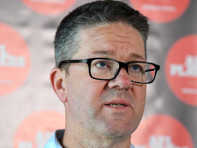 The AFL Players' Association (AFLPA) CEO Paul Marsh addresses the media on the AFLPA Boards position regarding COVID-19 during a press conference at AFLPA Office in Melbourne, Tuesday, March 17, 2020. Marsh has announced that both AFL and AFLW playing groups are prepared to play as soon as they are given the green light by the AFL. (AAP Image/James Ross) NO ARCHIVING