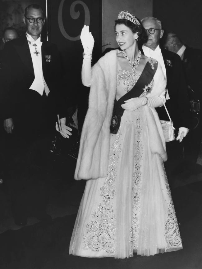 Queen Elizabeth II arrives at a state reception at City Hall in Hobart in 1954. Picture: Fox Photos/Hulton Archive/Getty Images