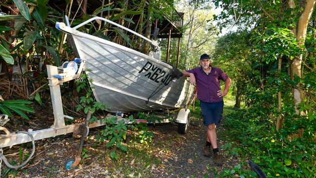 Aiden Ricketts of North Lismore has an escape plan which includes a fixed ladder from his back veranda and his trusty tinny. Picture: Cath Piltz