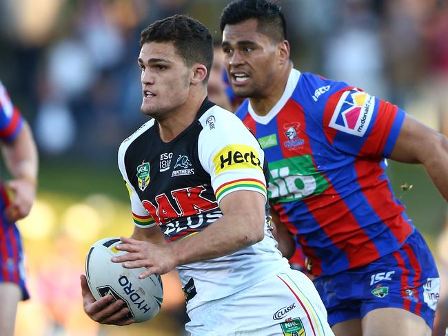 SYDNEY, AUSTRALIA - AUGUST 18:  Nathan Cleary of the Panthers is tackled during the round 23 NRL match between the Penrith Panthers and the Newcastle Knights at Panthers Stadium on August 18, 2018 in Sydney, Australia.  (Photo by Matt Blyth/Getty Images)