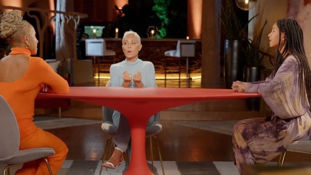 Willow Smith sits around the red table with her mother and grandmother. Picture: Red Table Talk Facebook