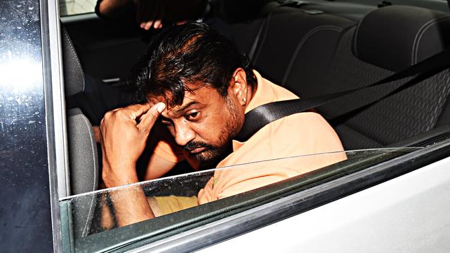 Dr Praveen Kumar arrives at the Townsville watchhouse. Picture: Zak Simmonds