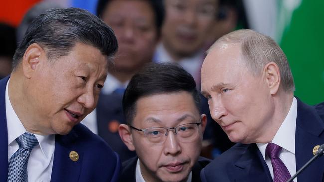 Russian President Vladimir Putin and Chinese President Xi Jinping speak during a plenary session at the BRICS summit in Kazan in October 2024. Picture: AFP