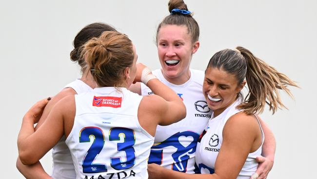 HOBART, AUSTRALIA - OCTOBER 13: Tahlia Randall of the Kangaroos celebrates a goal  during the round seven AFLW match between North Melbourne Kangaroos and Sydney Swans at North Hobart Oval, on October 13, 2024, in Hobart, Australia. (Photo by Steve Bell/AFL Photos/via Getty Images)