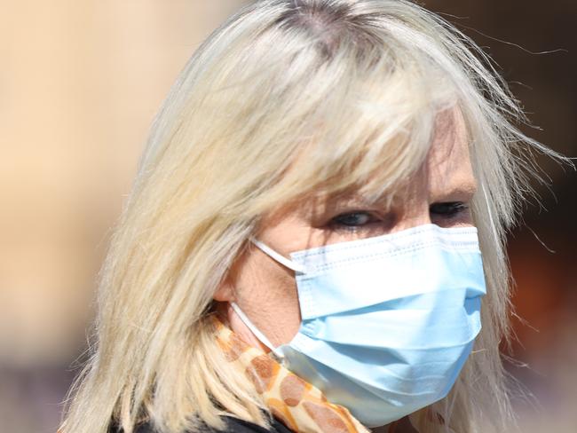 ADELAIDE, AUSTRALIA - NewsWire Photos MARCH 10,  2022: Amanda Deyer is seen outside the Adelaide Magistrates Court. She has pleaded guilty to eight charges of theft stealing over 1.3 million dollars: NCA NewsWire / David Mariuz