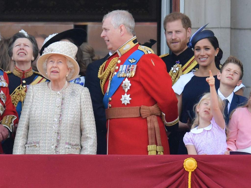 Now it’s Prince Andrew who seems to have forgotten rules while Meghan and Harry face the crowd. Picture: AFP